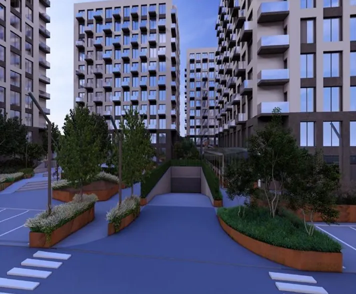Vizualizare a curții interioare a ansamblului Aurel Vlaicu 87, Iași: blocuri rezidențiale cu balcoane, alei, jardiniere și rampa de acces la parcarea subterană